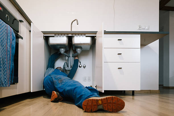 Professional Plumbing technician working in Oakfield, WI
